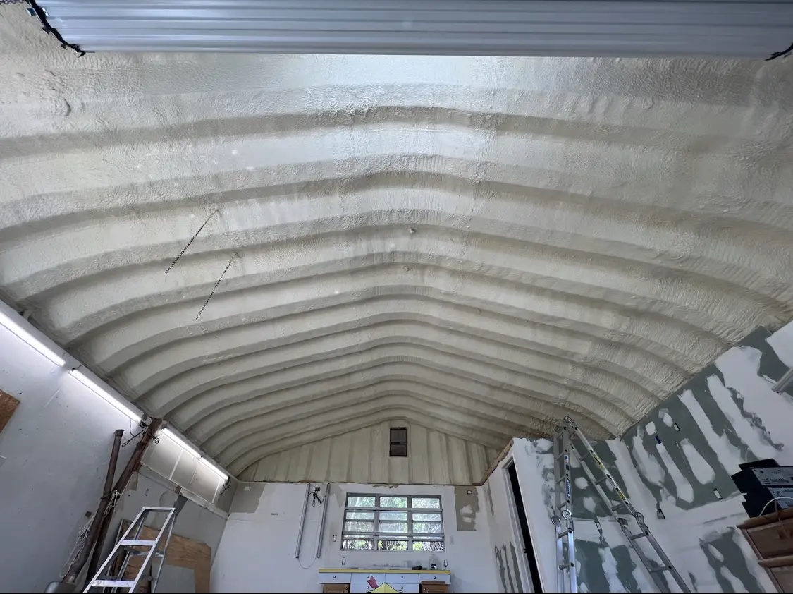 Spray polyurethane foam applied to the underside of a metal roof deck in Libertyville